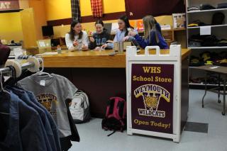 weymouth school store students working